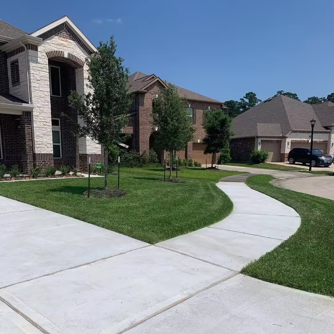 Landscaping in humble, TX featuring front lawn and landscaping