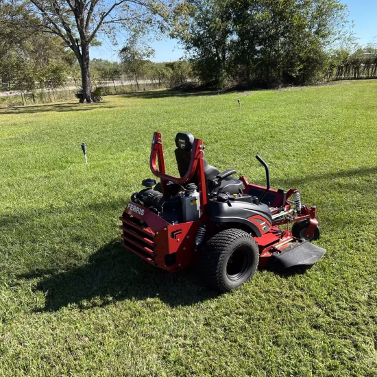Commercial property cleanup service in Houston, Texas, with a professional team restoring a business property's lawn to a clean and well-maintained condition.